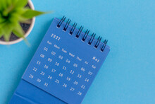 Desktop Blue Calendar For May 2022 On A Blue Background.