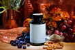 Blank label medicine pill bottle surrounded by fresh food ingredients like salmon, berries, and nuts