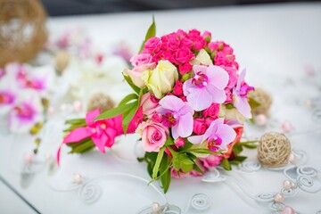 Beautiful, bright, saturated with colors bridal bouquet of various flowers. Wedding, Husband and wife, happy together, marriage, just married, wedding rings, flowers, decor, bouquet, peonies, roses.