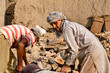 © Ali Magsi - poor laborers working on a building construction site