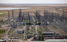 GRES-1 Thermal Power Station. Transformer And Distribution Substation. Steppe And Lake On Background, Blue Sky.Aerial View. Ekibastuz, Pavlodar Region, Kazakhstan.