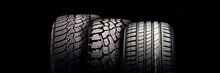 New Mud Tire For Off-road Cars SUV Close-up Tread On Black Background
