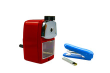Side view of blue stapler and red metal pencil sharpenner on white background, Stationery office and school items.