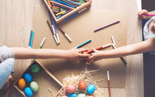 Children Prepare For Easter. Kids Painting Easter Eggs. Easter Background, Flat Lay, Top View.