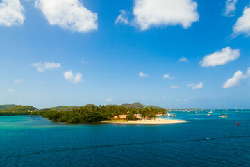 Wall Mural - The coast of the island of Martinique in the Caribbean. Yachts, palm trees, beaches and turquoise water. Paradise island of Martinique.