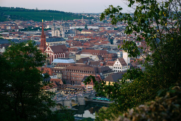 Wall Mural - Sunset over the river Main and the streets from Würzburg in Germany.