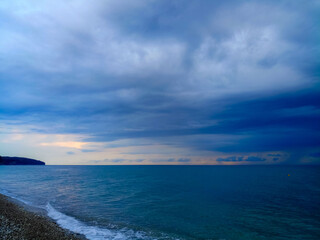 Wall Mural - Amazing sea sunset, the sun, waves, clouds
