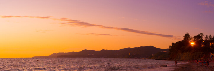 Wall Mural - Amazing sea sunset, the sun, waves, clouds