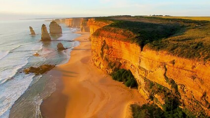 Poster - Aerial view of Twelve Apostles at sunset. Giant rocks above the sea at dusk, Australia