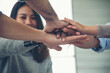 © aFotostock - Group of diversity people fist bump holding hands together power of tag team. Teamwork Multiethnic people group working togetherness. Business people team holding hands successful. Business meeting