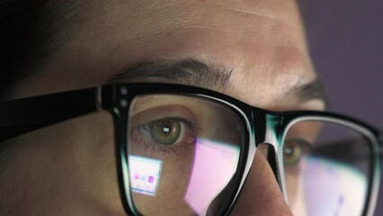 Aufkleber - Woman with glasses working at home at night. Listing web page. Closeup video. 4k footage