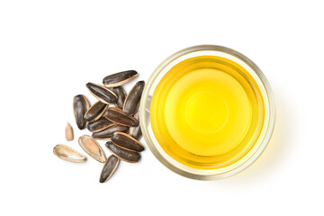 Wall Mural - Flat lay of Sunflower oil with seeds isolated on white background.