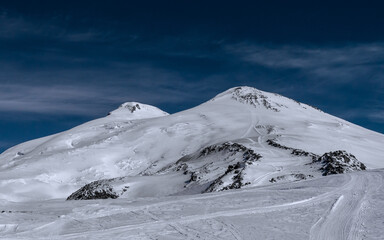 Wall Mural - Amazing snowy mountain landscape of the Caucasus, peaks of mount Elbrus on a clear blue sky day