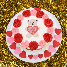 A Beautiful Cake Decorated With Red And Pink Hearts, Roses, And A Bear