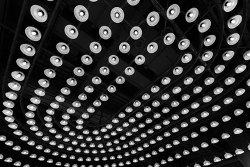 Aufkleber -  light bulb mounted on industrial style ceiling. Modern building interior abstract background