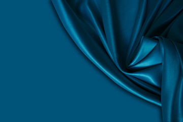 Wall Mural - Beautiful elegant wavy dark blue satin silk luxury cloth fabric with monochrome background design. Copy space