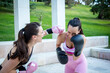 © luisrojasstock - two women practicing a fun boxing match