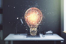 Double Exposure Of Creative Light Bulb Hologram And Modern Desktop With Laptop On Background, Research And Development Concept