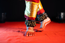 Close Up Shot Of Indian Bharatanatyam Dancer Feet With Ghungroo Kathak Or Musical Anklet Dancing On Stage - Concept Of Indian Culture, Classical Dance And Traditions