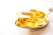 omega 3 vitamins yellow capsules close