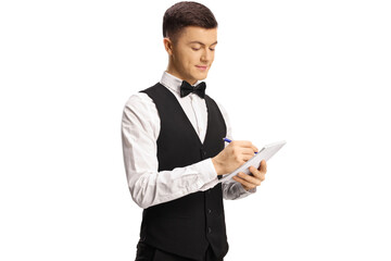 Poster - Young male server with a bow tie writing down an order