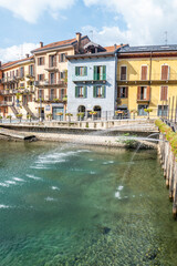 Wall Mural - The beautiful Omegna, with splendid buildings that are reflected on Lake Orta