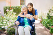 © Cecilie Skjold Wackerhausen/peopleimages.com - Ive got her back. Shot of a resident and a nurse outside in the retirement home garden.