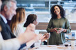 © Adene Sanchez/peopleimages.com - I couldnt have done it without all of you. Cropped shot of a group of businesspeople applauding a colleague while sitting in the boardroom during a meeting.
