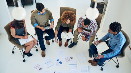 Poster - Theyre a results driven team. Shot of a group of colleagues having a meeting in a modern office.