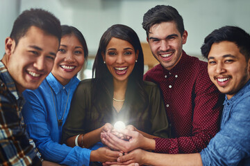 Aufkleber - Growing their dreams together. Portrait of a team of designers holding a glowing ball in an office.
