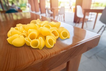 Wall Mural - raw macaroni pasta noodles. Food concept