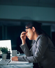 Poster - overtime can come with headaches. shot of a young businesswoman experiencing a headache in the offic