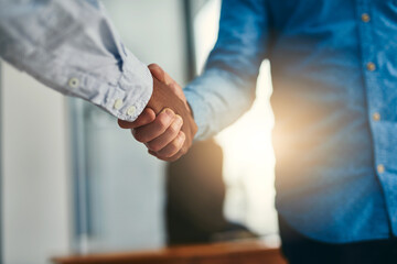 Aufkleber - Lets shake on it. Closeup shot of businesspeople shaking hands in an office.