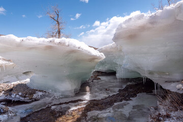 Wall Mural - river ice frozen icicles mountains spring