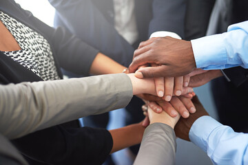 Poster - Success is a combined effort. Shot of businesspeople working in a modern office.