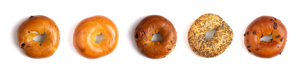 A Row of Five Different Types of Bagels Isolated on a White Background