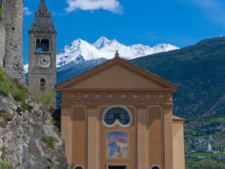 Wall Mural - A beautiful shot of an old church in the background of mountains.