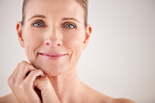 Keeping Her Skin Looking Great With Good Beauty Habits. Cropped Studio Portrait Of An Attractive Mature Woman.