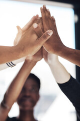 Poster - Time to unify. Cropped shot of a group of colleagues giving each other a high five at work.