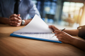 Aufkleber - Combing through the fine print. Cropped shot of a man and woman completing paperwork together at a desk.