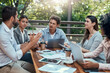 © Jadon Bester/peopleimages.com - Different venue, different perspectives. Shot of a group of colleagues having a meeting at a cafe.