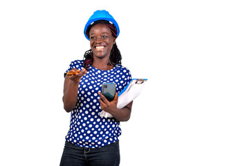 Wall Mural - young female engineer holding mobile phone and clipboard smiling.