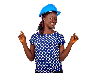 Wall Mural - portrait of a young female engineer showing different dimensions with her fingers while smiling.