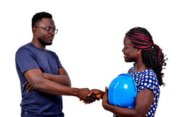 Wall Mural - young man shaking hands with young female engineer.