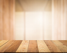 Empty Wooden Table Top With Blur Image Of A Wood Corridor In The Hotel Or Bar Interior Luxury Lobby In The Perspective Background, Copy Space For Your Text Ready For Product Promotion Display Montage