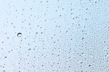 drops glass blue background abstract, transparent cold background water splashes