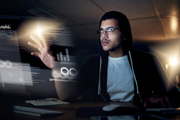 Aufkleber - Hacking is a skill that comes second-nature to him. Shot of a young hacker cracking a computer code in the dark.