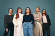 © Jacob Lund - Smiling women fo different ages standing together