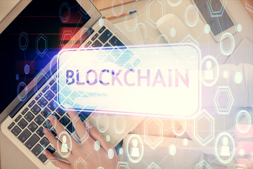Poster - Double exposure of woman hands working on computer and blockchain theme hologram drawing. Top View. bitcoin cryptocurrency concept.