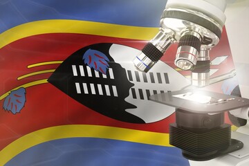 Wall Mural - Microscope on Swaziland flag background - science development concept. Research in medicine or vaccine 3D illustration of object